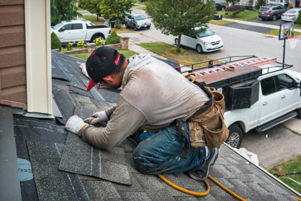 Professional Roofing technician working in Chester, NH